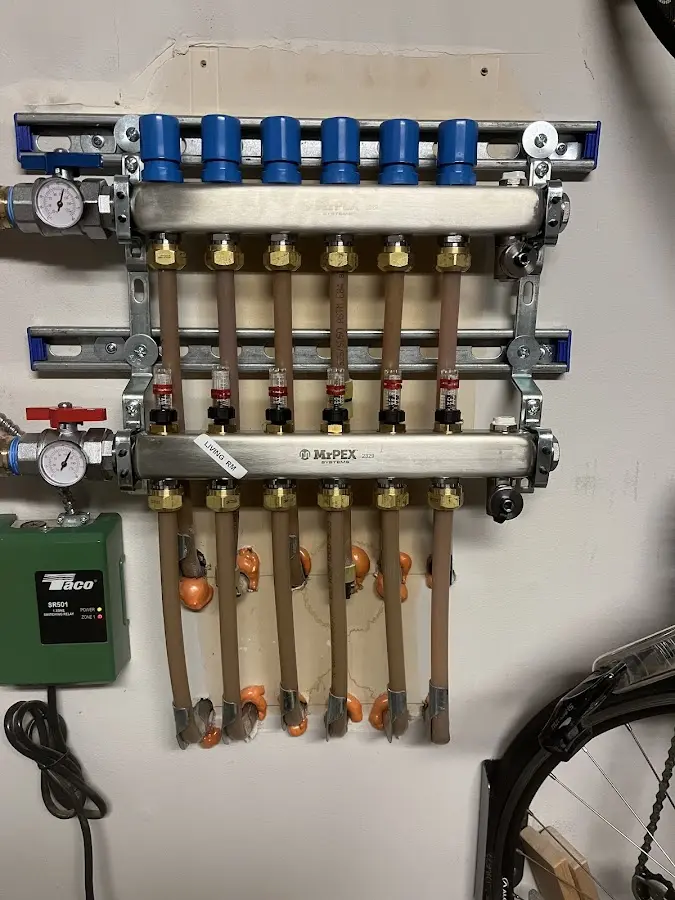 Plumber performing Sink Repair at a residential property in Holly